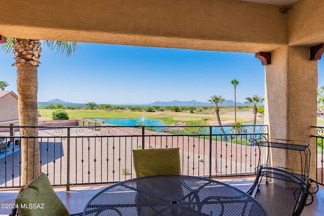 balcony featuring a mountain view