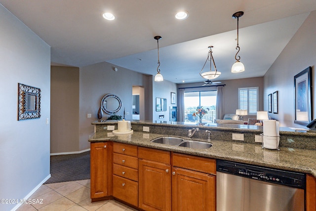 kitchen with light colored carpet, sink, pendant lighting, and dishwasher