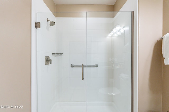 bathroom featuring an enclosed shower