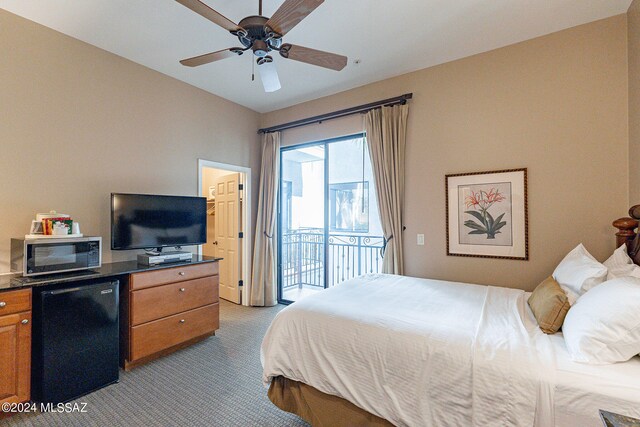 bedroom featuring light colored carpet, ceiling fan, access to exterior, and fridge