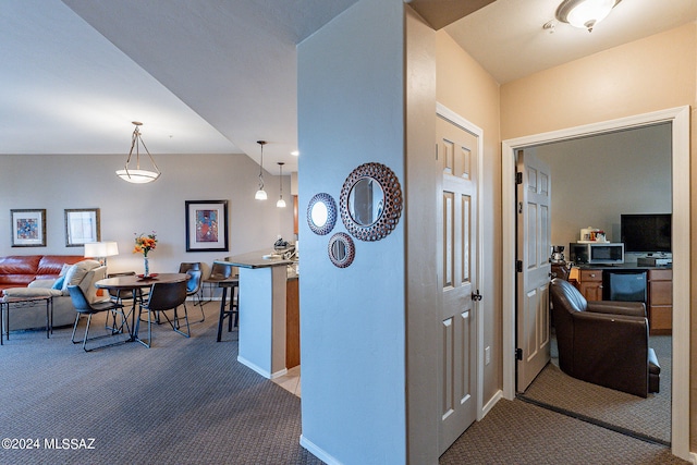 corridor featuring carpet flooring