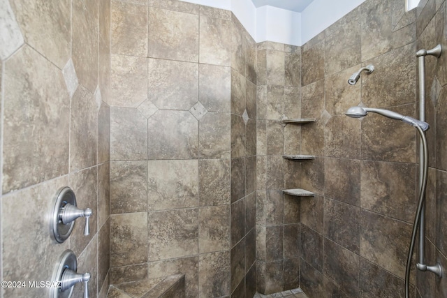 details with a tile shower