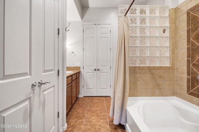 bathroom featuring tile floors and vanity