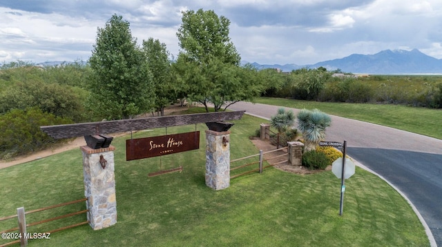 exterior space with a front yard and a mountain view