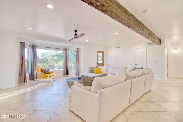 living room with beamed ceiling, ceiling fan, and light tile patterned flooring