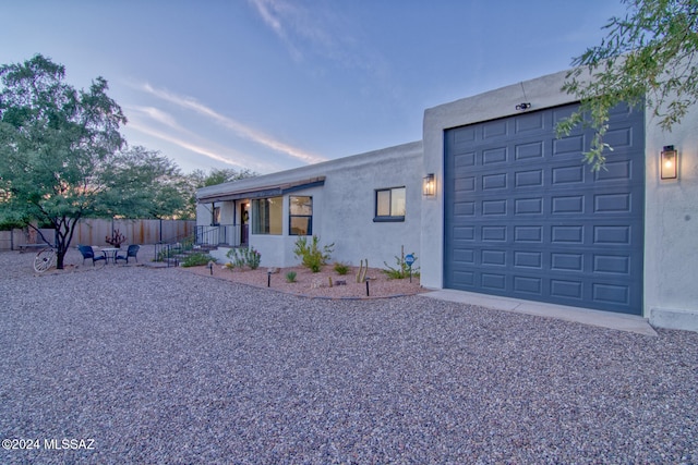 view of front of home with a garage