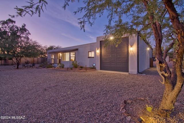 view of front of home with a garage