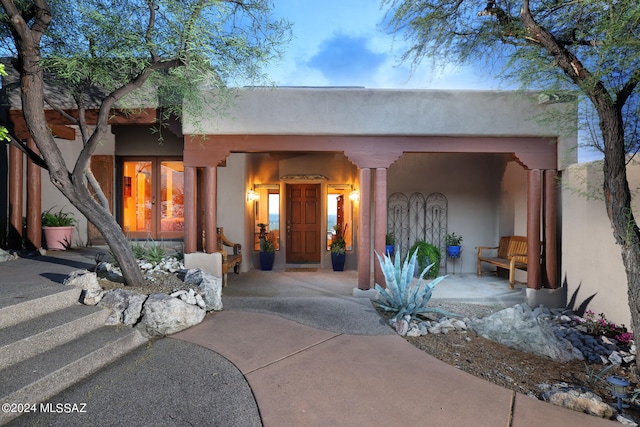 view of adobe home