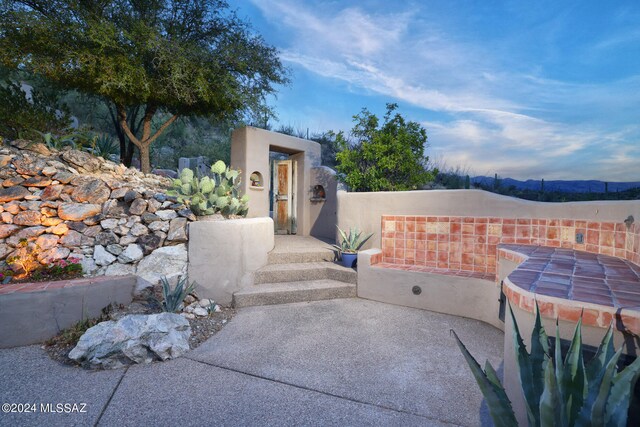 view of patio / terrace with a mountain view