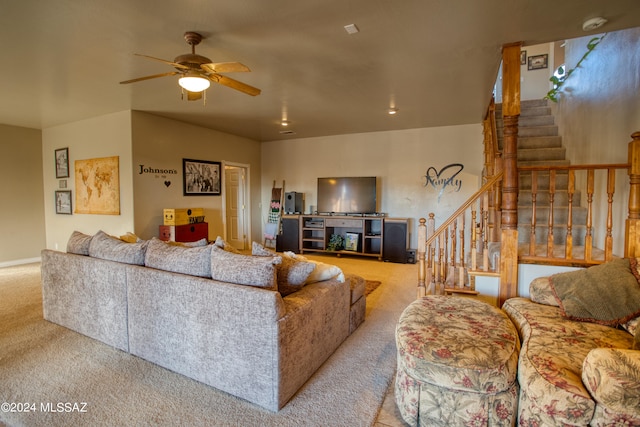 living room with ceiling fan and carpet floors