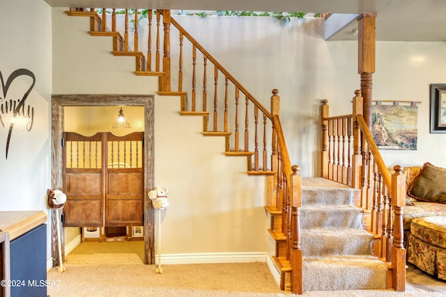 staircase with carpet