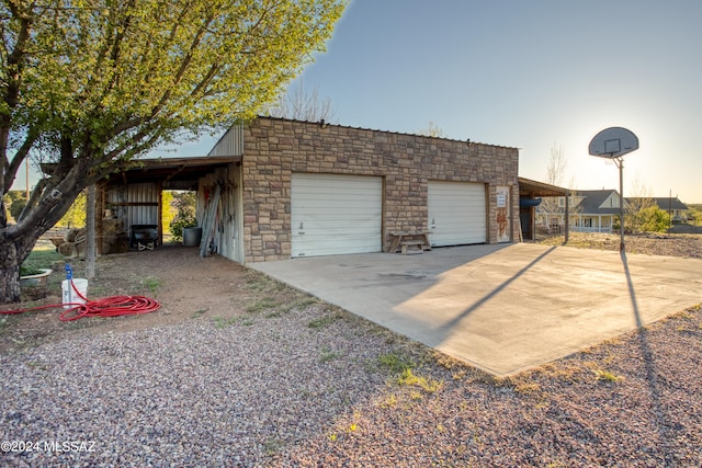 garage featuring a carport