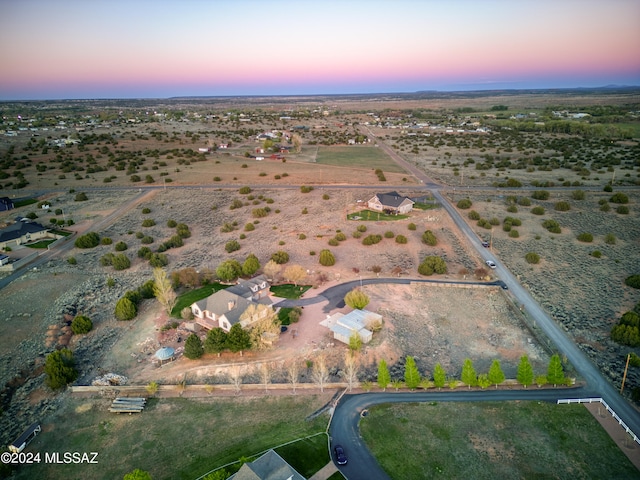 view of aerial view at dusk