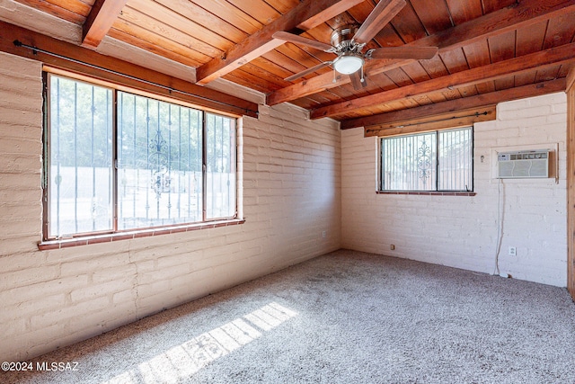 carpeted empty room with brick wall, ceiling fan, beam ceiling, and wood ceiling