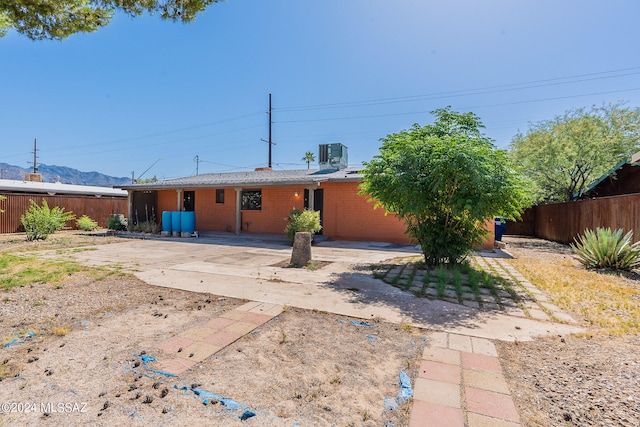 back of property featuring a patio