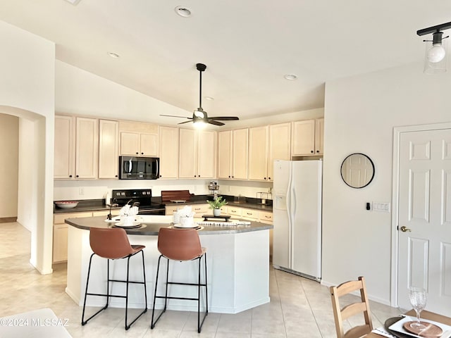 kitchen featuring light tile patterned floors, a kitchen island with sink, black range with electric stovetop, white fridge with ice dispenser, and vaulted ceiling