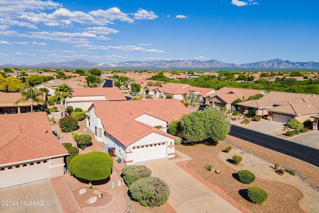 drone / aerial view featuring a mountain view