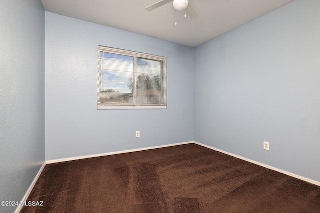 unfurnished room with carpet and ceiling fan