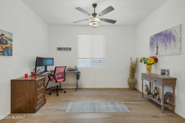 office area with ceiling fan and light wood-type flooring