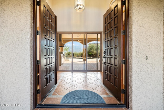 entryway featuring light tile patterned floors