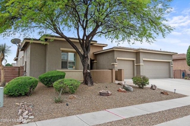 view of front of home with a garage