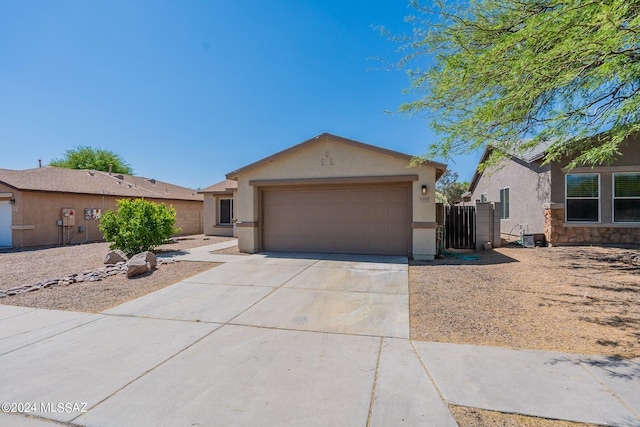 single story home with a garage