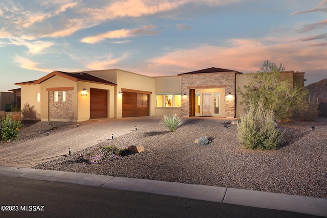 view of front of property featuring a garage