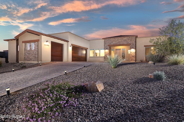 view of front of property featuring a garage