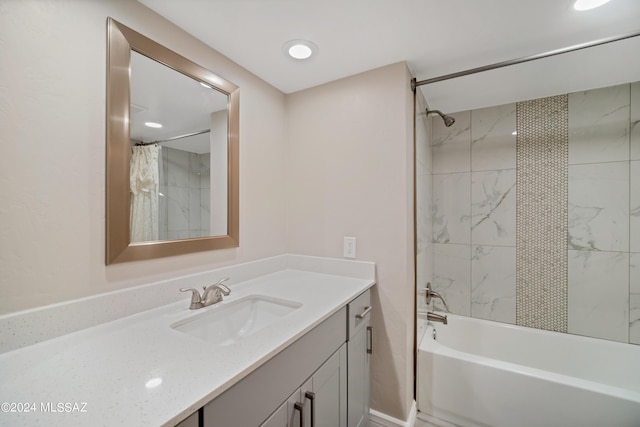 bathroom featuring vanity and shower / tub combo