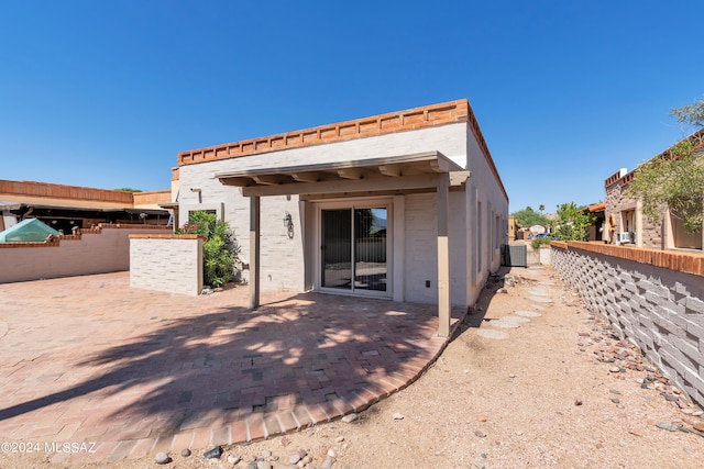 rear view of house featuring a patio area