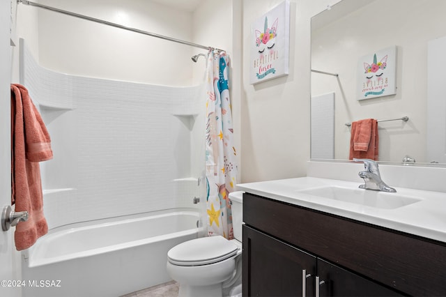 full bathroom with shower / bath combo, toilet, and vanity