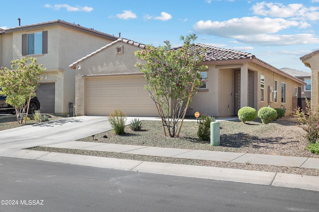 view of front of property featuring a garage