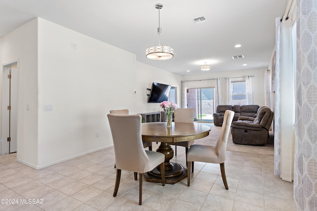 view of tiled dining space