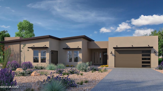 view of front of home with a garage