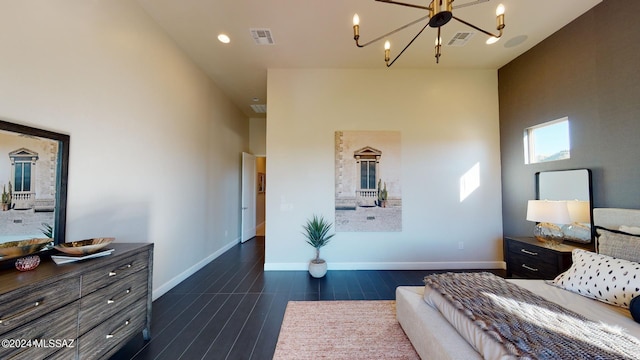 bedroom featuring a chandelier