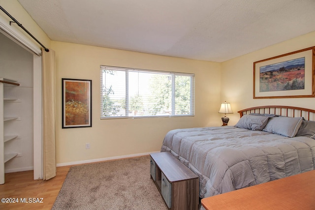 bedroom featuring light hardwood / wood-style flooring