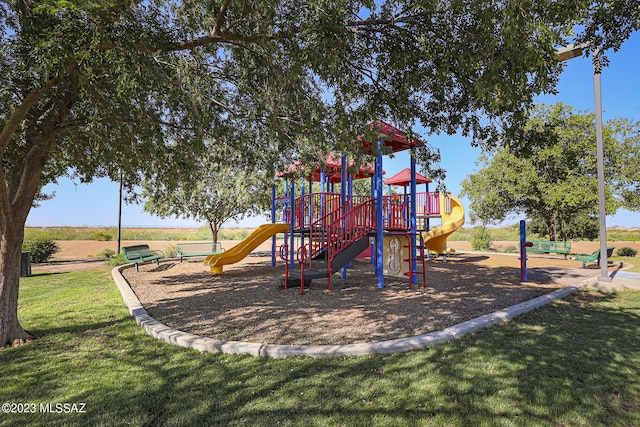 view of jungle gym featuring a yard