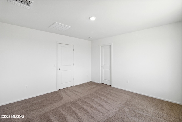 spare room with carpet