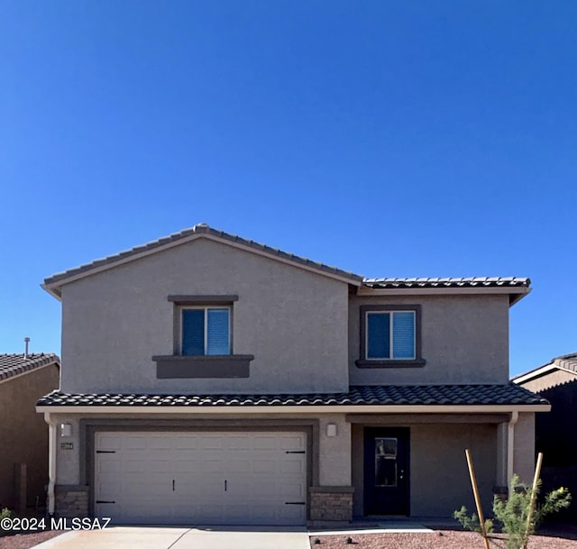 view of front of home featuring a garage