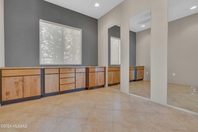 empty room with light tile patterned flooring