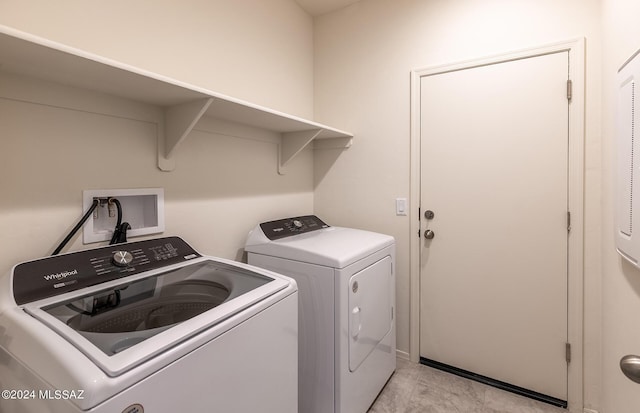 laundry area with washer and dryer