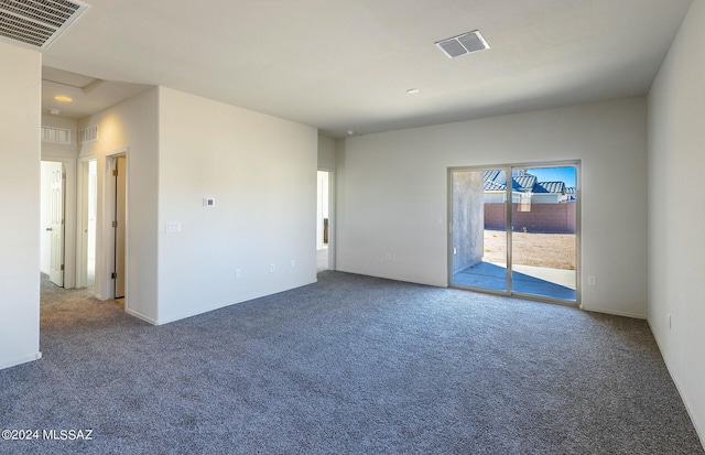 empty room featuring carpet floors