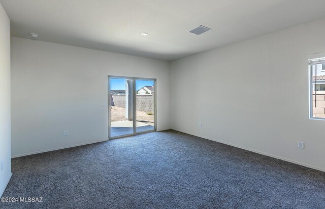 empty room featuring carpet floors