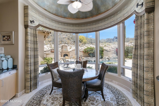 dining area featuring a wealth of natural light and ceiling fan