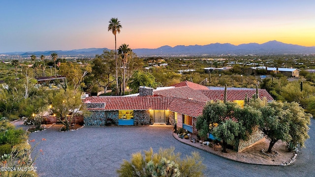 aerial view at dusk with a mountain view