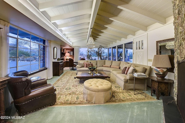 living room with beam ceiling and high vaulted ceiling