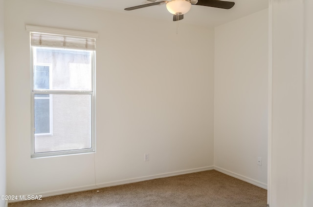 unfurnished room featuring carpet flooring and ceiling fan