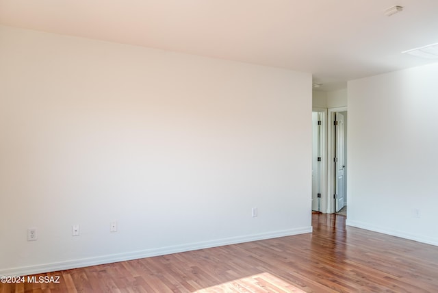 unfurnished room featuring light hardwood / wood-style floors