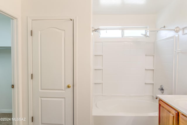 bathroom with shower / tub combination and vanity