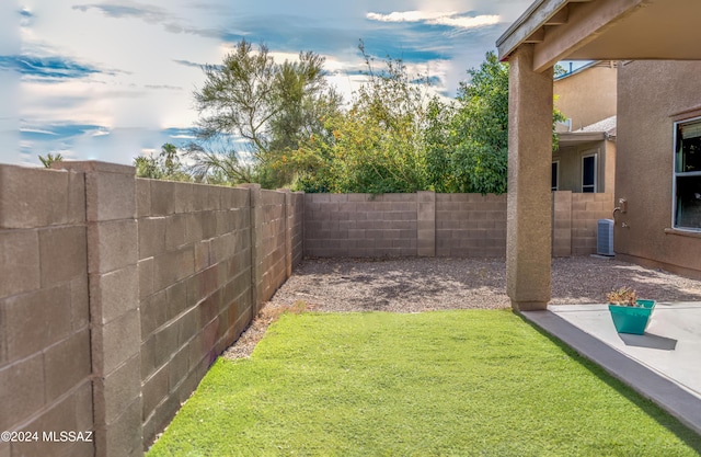 view of yard with central AC